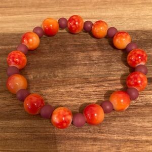Handmade Orange and Red Beaded Bracelet